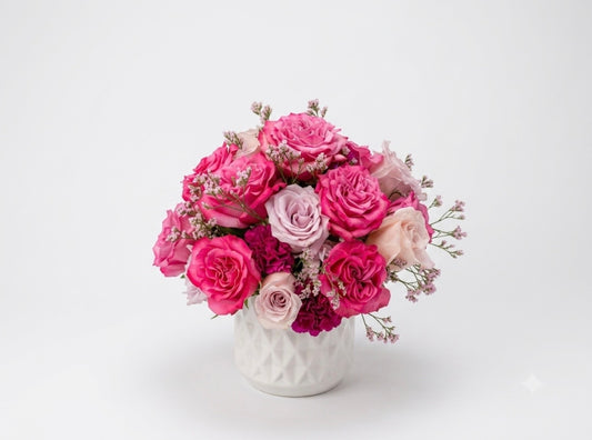Floral Centerpiece in Ceramic Vase